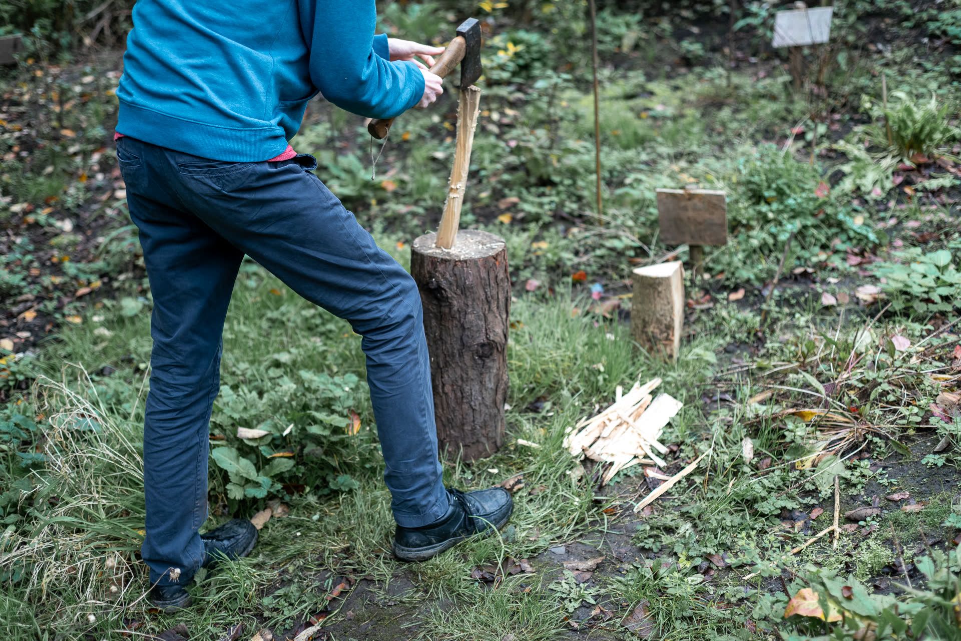Birch participant chopping wood